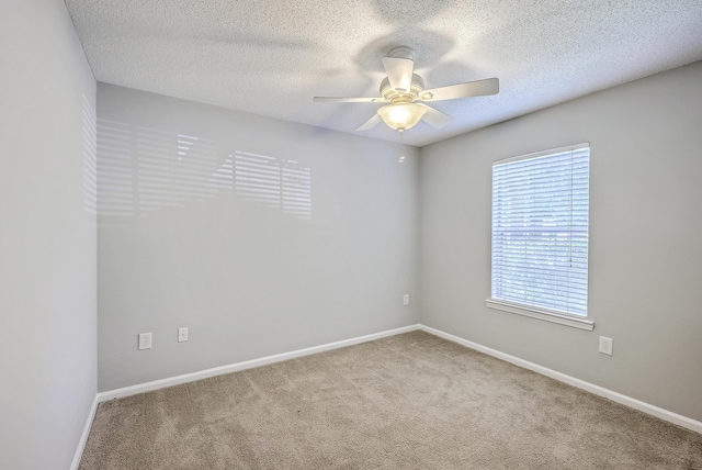 188 Midland Pkwy Unit 516, Summerville, SC 29485 - spare room featuring ceiling fan, carpet, a textured ceiling, and baseboards