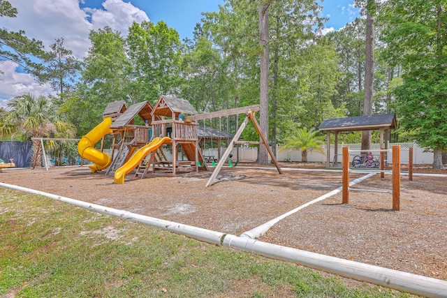 188 Midland Pkwy Unit 516, Summerville, SC 29485 - community playground with fence and view of wooded area
