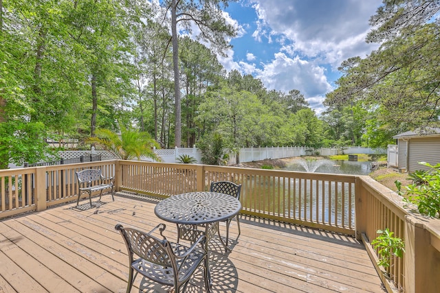 188 Midland Pkwy Unit 516, Summerville, SC 29485 - deck with a fenced backyard, a water view, and view of wooded area