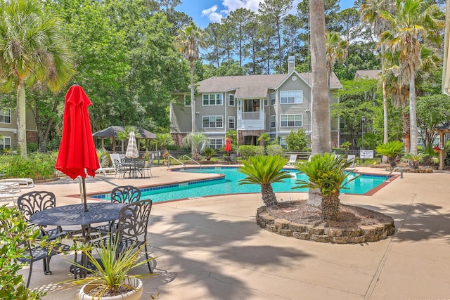 188 Midland Pkwy Unit 516, Summerville, SC 29485 - community pool with a patio and fence
