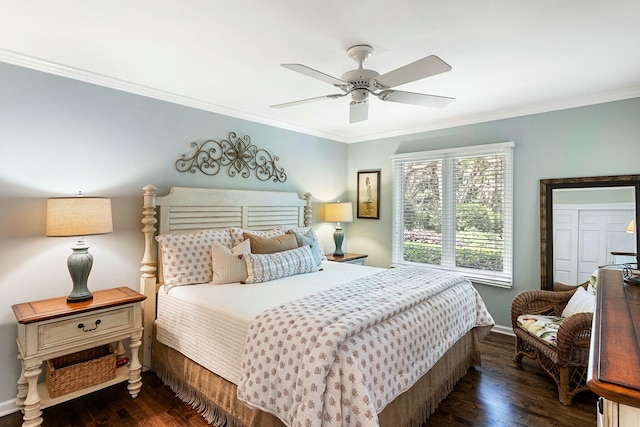 bedroom with baseboards, dark wood-style floors, ornamental molding, and ceiling fan