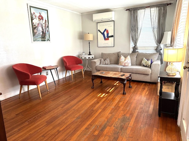 living room with dark hardwood / wood-style flooring, a wall unit AC, and crown molding