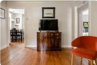 living area featuring hardwood / wood-style floors