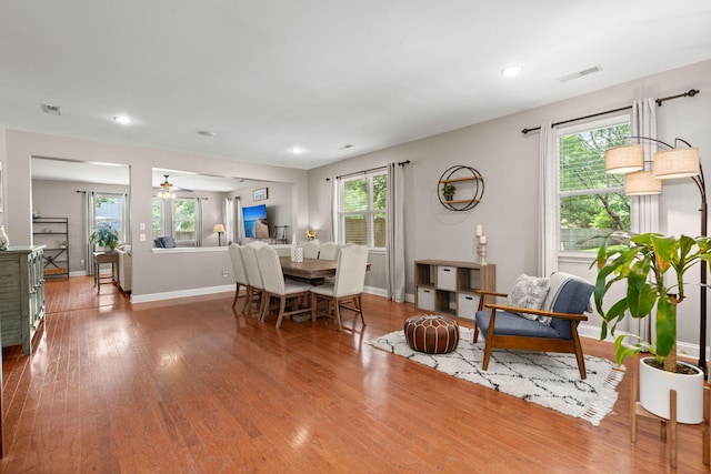 7030 Billberry St, Hanahan, SC 29410 - dining room with healthy amount of natural light, wood finished floors, a ceiling fan, and recessed lighting