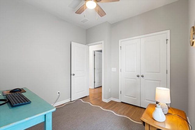557 Blueway Ave, Summerville, SC 29486 - home office with wood finished floors, ceiling fan, and baseboards