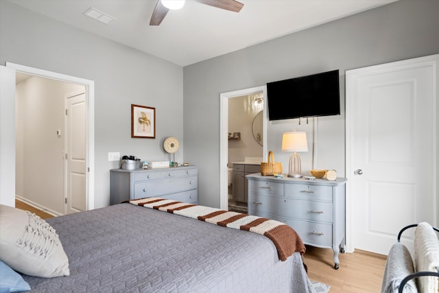 557 Blueway Ave, Summerville, SC 29486 - bedroom featuring light wood-style floors, a ceiling fan, and ensuite bath