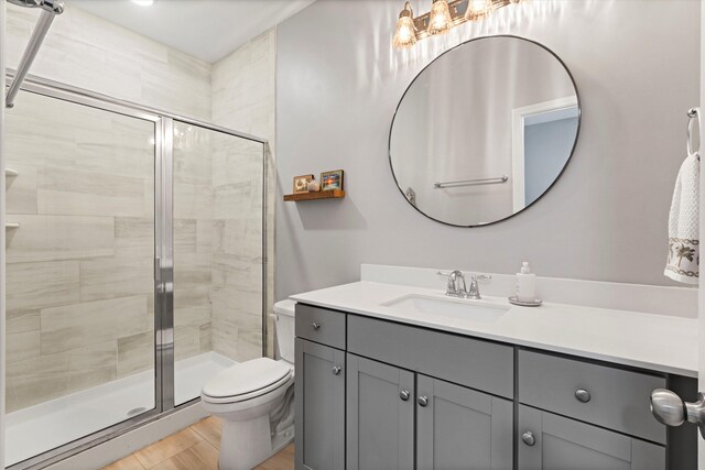 557 Blueway Ave, Summerville, SC 29486 - bathroom with vanity, a stall shower, and toilet