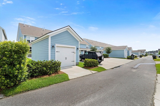 557 Blueway Ave, Summerville, SC 29486 - ranch-style house with a residential view, concrete driveway, and a garage