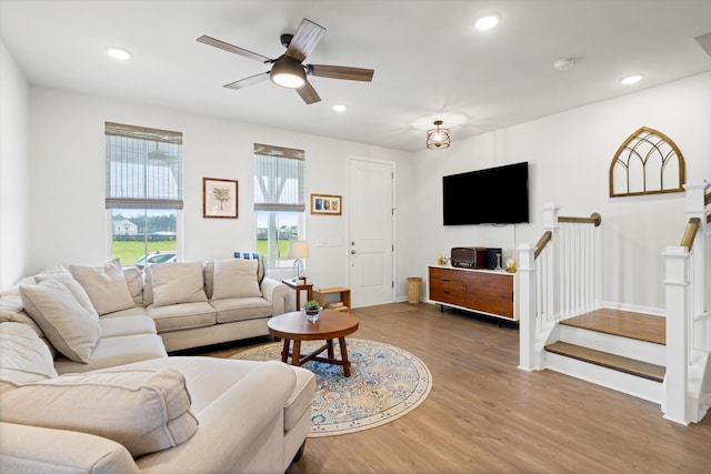 557 Blueway Ave, Summerville, SC 29486 - living area with wood finished floors, a ceiling fan, recessed lighting, stairs, and baseboards