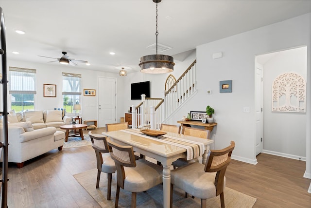 557 Blueway Ave, Summerville, SC 29486 - dining space with wood finished floors, stairway, ceiling fan, baseboards, and recessed lighting