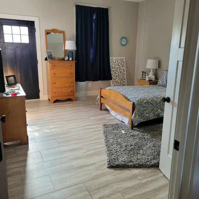 bedroom featuring wood finished floors