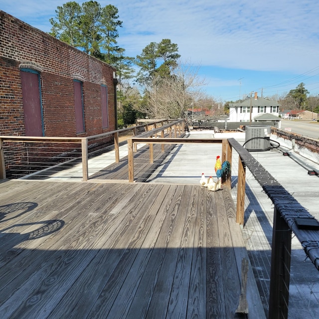 wooden terrace with central air condition unit