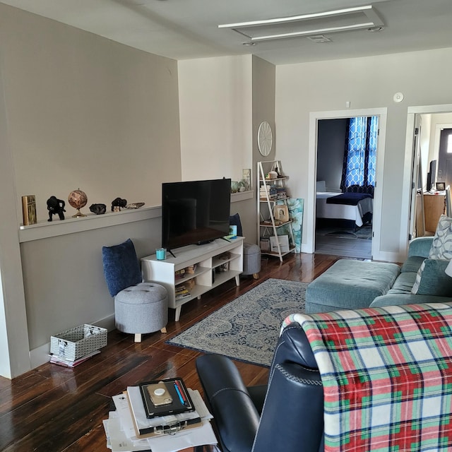 living room with wood finished floors