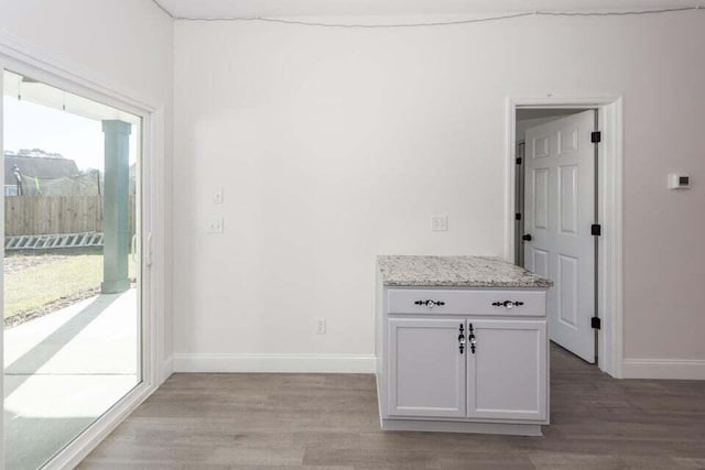 hallway featuring light hardwood / wood-style flooring