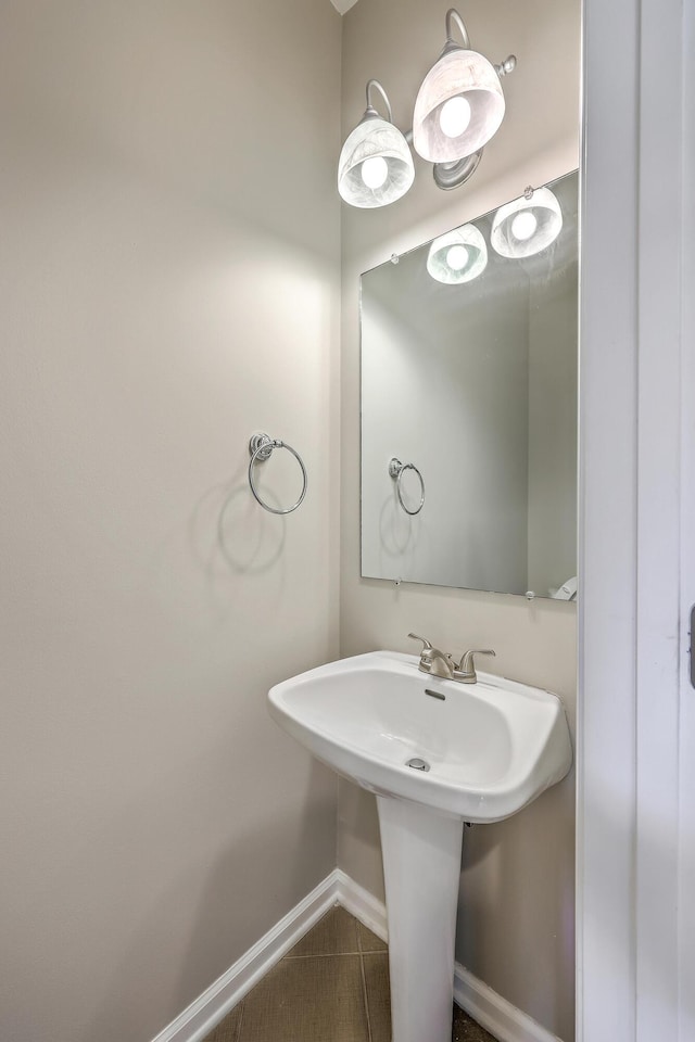 9379 Harroway Rd, Summerville, SC 29485 - bathroom with tile patterned flooring and baseboards