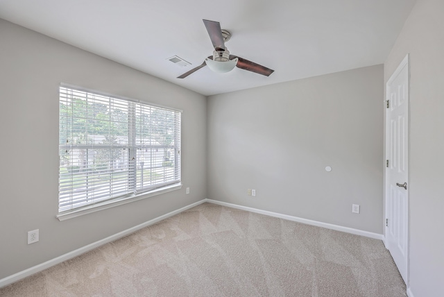 9379 Harroway Rd, Summerville, SC 29485 - unfurnished room featuring baseboards, a ceiling fan, carpet flooring, and visible vents