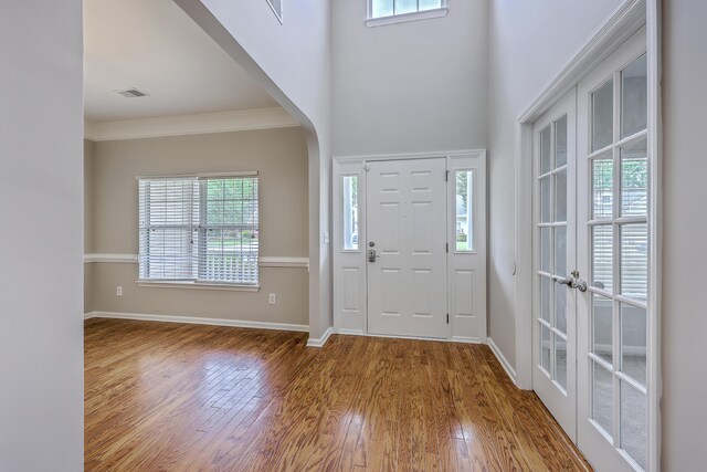 9379 Harroway Rd, Summerville, SC 29485 - entryway with plenty of natural light, baseboards, and wood finished floors
