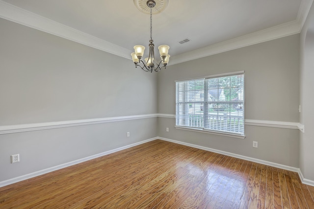 9379 Harroway Rd, Summerville, SC 29485 - unfurnished room with baseboards, wood finished floors, visible vents, and a chandelier