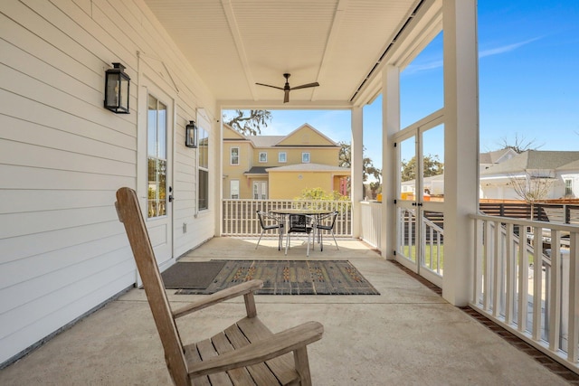 view of patio / terrace with outdoor dining area and ceiling fan