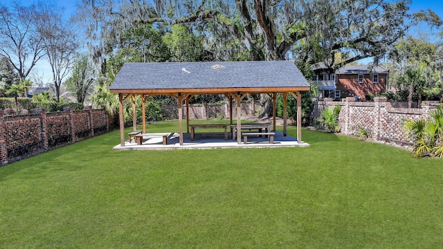 view of yard featuring a gazebo, a patio, and a fenced backyard