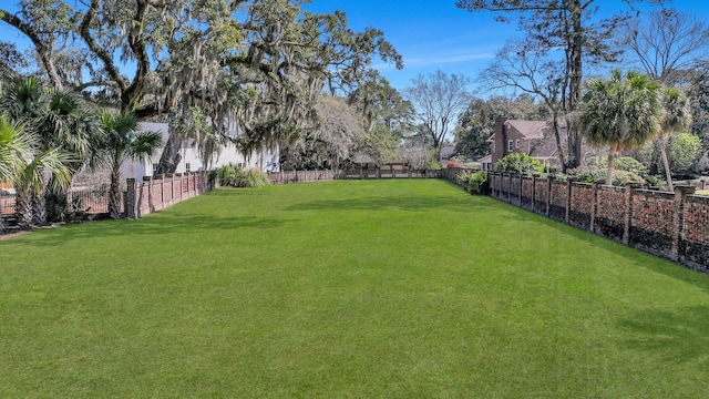 view of yard featuring a fenced backyard