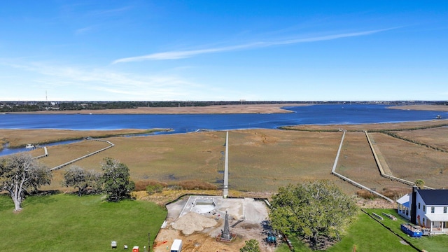 aerial view featuring a rural view and a water view