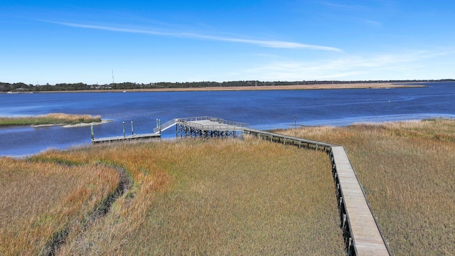 view of water feature with a dock