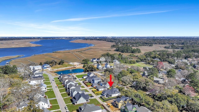 bird's eye view featuring a residential view and a water view