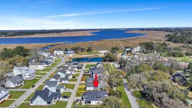 bird's eye view featuring a water view and a residential view