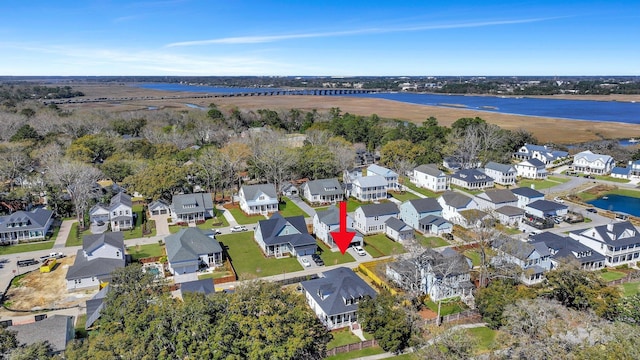 aerial view with a residential view and a water view