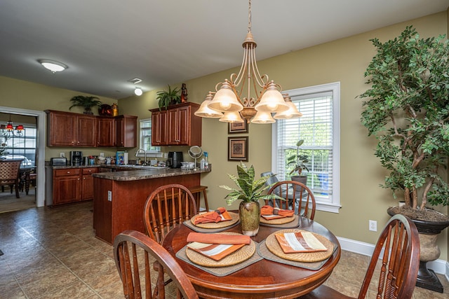1409 Bloomingdale Ln, Mount Pleasant, SC 29466 - dining area featuring a chandelier and baseboards