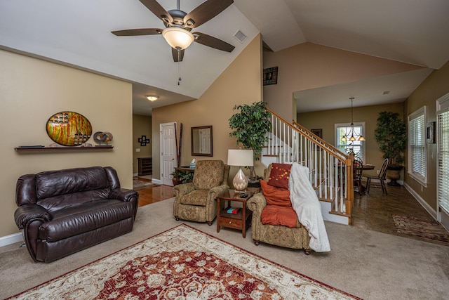 1409 Bloomingdale Ln, Mount Pleasant, SC 29466 - living room with stairway, carpet floors, baseboards, ceiling fan, and high vaulted ceiling