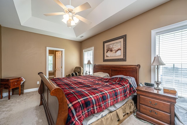 1409 Bloomingdale Ln, Mount Pleasant, SC 29466 - bedroom featuring a raised ceiling, light carpet, baseboards, and a ceiling fan