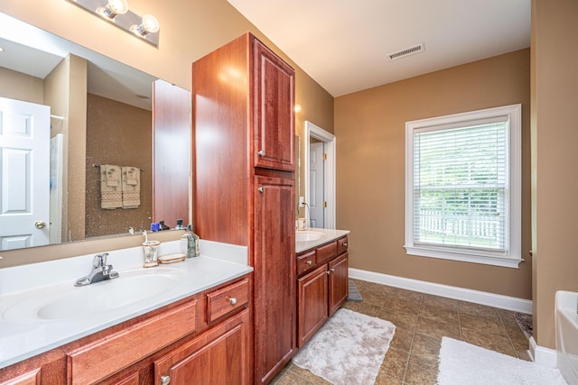 1409 Bloomingdale Ln, Mount Pleasant, SC 29466 - bathroom featuring vanity, baseboards, tile patterned floors, and a tub