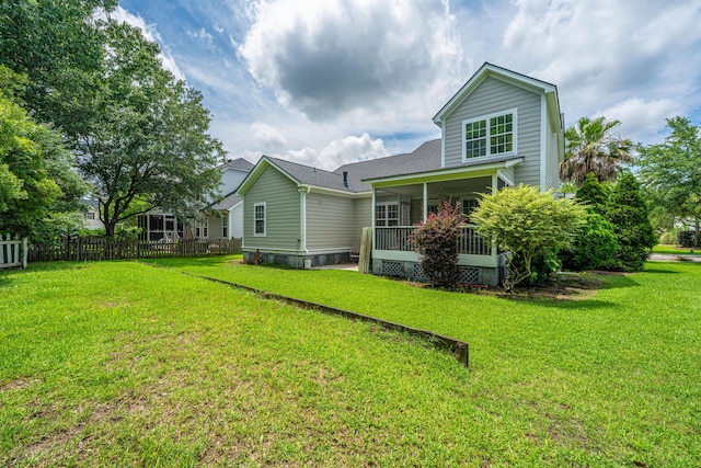 1409 Bloomingdale Ln, Mount Pleasant, SC 29466 - rear view of property with a sunroom and a shingled roof