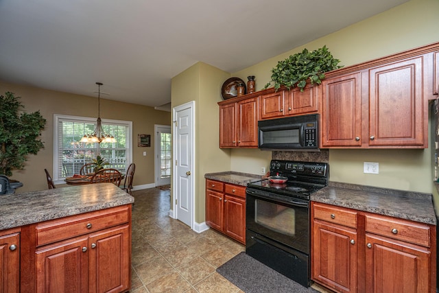 1409 Bloomingdale Ln, Mount Pleasant, SC 29466 - kitchen with black appliances, dark countertops, a chandelier, and pendant lighting