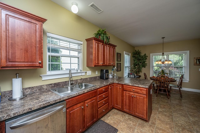 1409 Bloomingdale Ln, Mount Pleasant, SC 29466 - kitchen featuring stainless steel dishwasher, a sink, dark countertops, a peninsula, and a chandelier