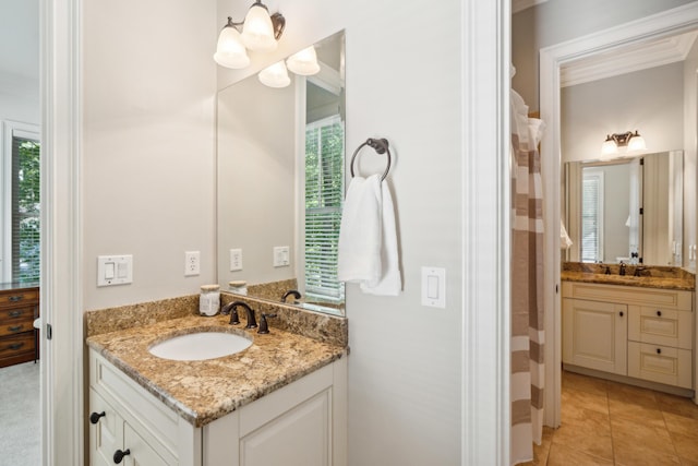 bathroom with vanity and tile patterned flooring