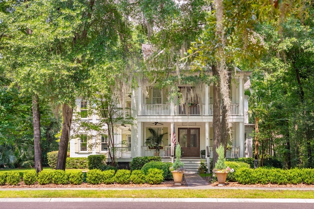 view of front of property with a balcony