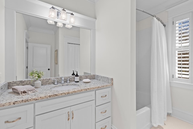 bathroom with a healthy amount of sunlight, shower / tub combo, crown molding, and vanity