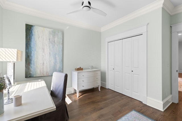 office featuring ornamental molding, a ceiling fan, baseboards, and wood finished floors