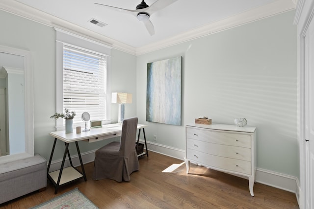 office area with visible vents, ornamental molding, ceiling fan, wood finished floors, and baseboards