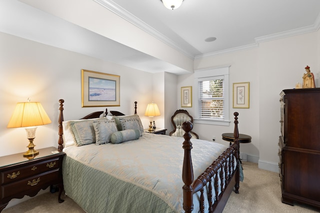 bedroom with carpet flooring, crown molding, and baseboards