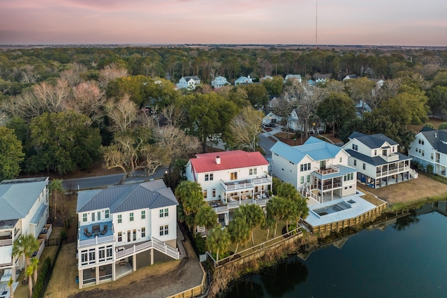 aerial view with a residential view and a water view