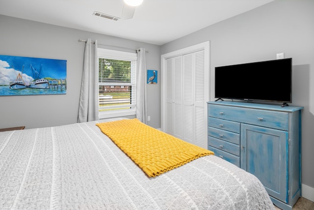 bedroom with a closet and a ceiling fan