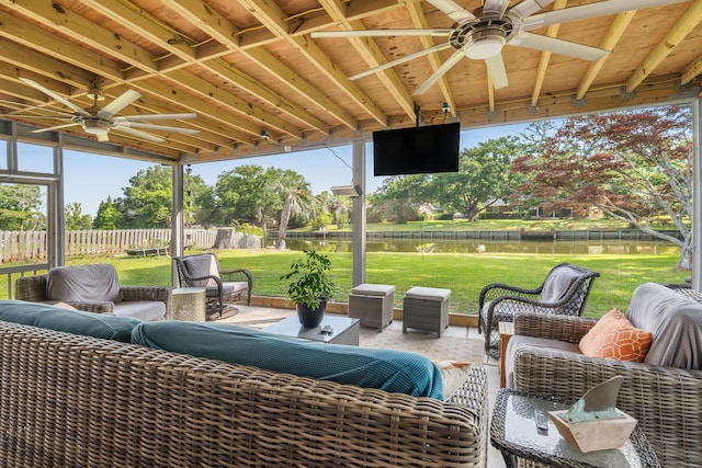 view of patio featuring ceiling fan and an outdoor living space