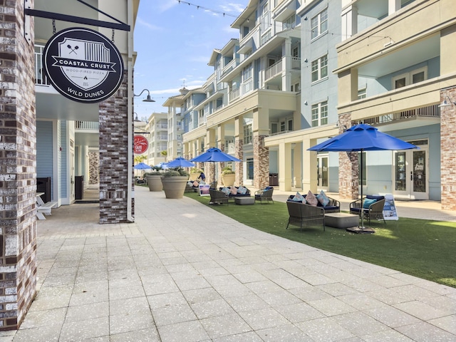 view of home's community with an outdoor hangout area