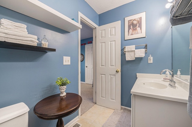 506 Arlington Dr Unit F, Charleston, SC 29414 - bathroom featuring toilet, vanity, and baseboards