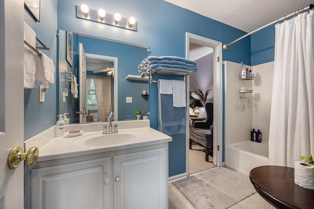 506 Arlington Dr Unit F, Charleston, SC 29414 - bathroom featuring shower / bath combo with shower curtain, vanity, and a textured ceiling