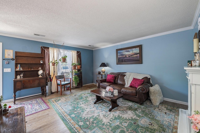 506 Arlington Dr Unit F, Charleston, SC 29414 - living room featuring a textured ceiling, wood finished floors, crown molding, and baseboards